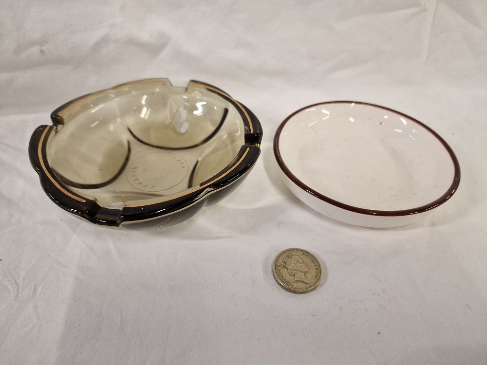 Lot 431: Two mid-century items comprising a Capri Pressguss smoked glass ashtray and a ceramic dish