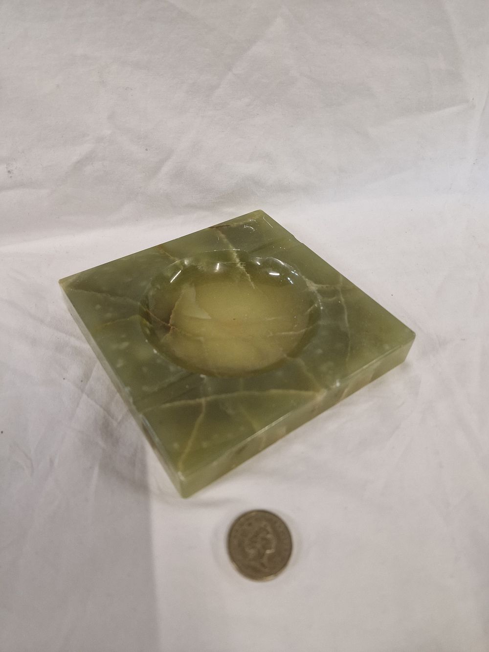 Lot 437: A Square Carved Green Onyx Ashtray