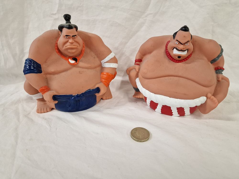 Lot 451: A Pair of MerchSource Black Series Sumo King Remote Control Wrestler Figurines