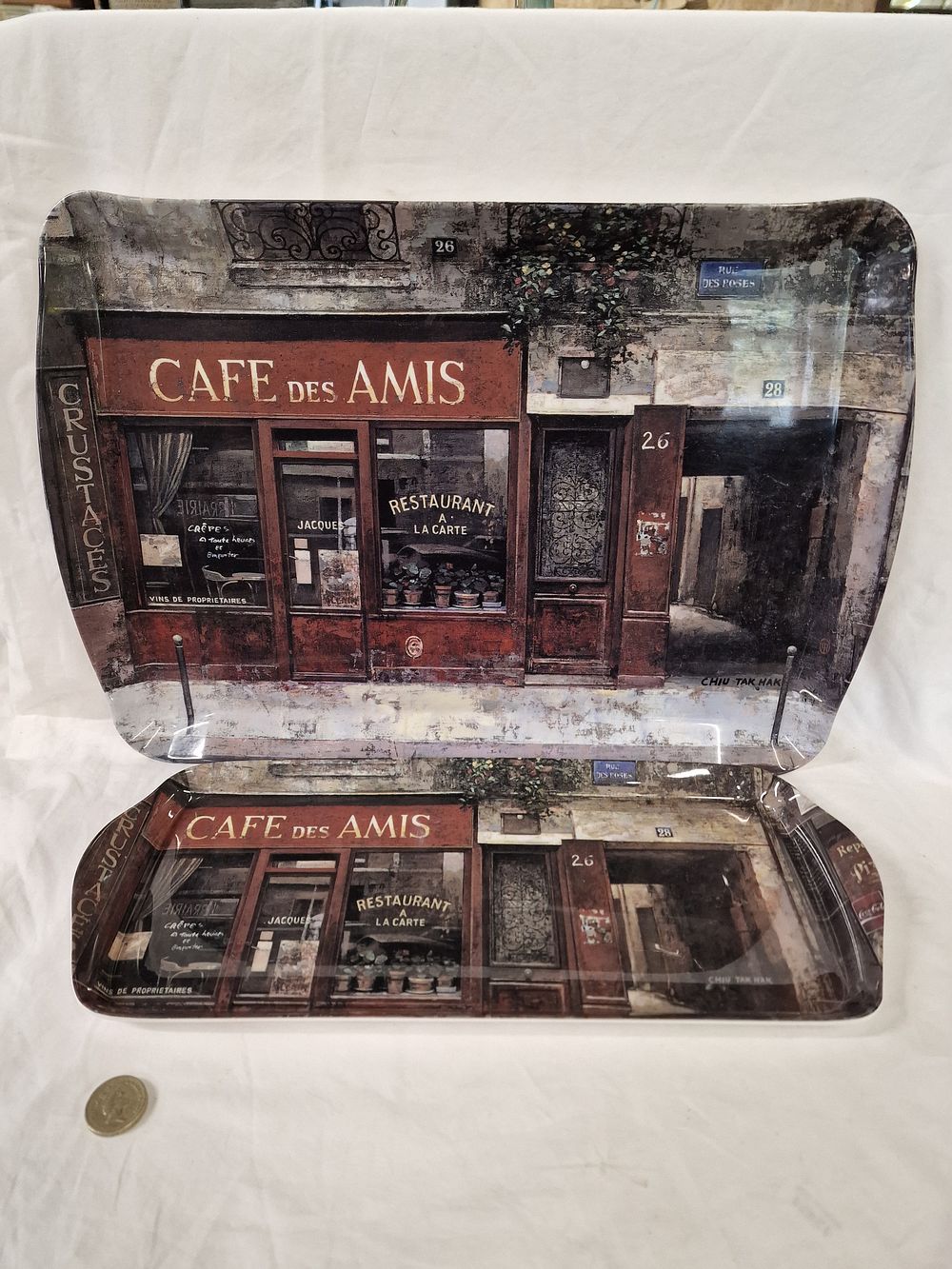 Lot 461: A Pair of Matalan Melamine Sandwich Trays with Chiu Tak Hak Cafe des Amis Design