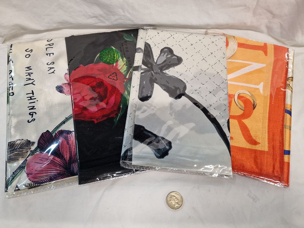 Lot 495: A lot of four contemporary printed scarves including one with Lanvin branding