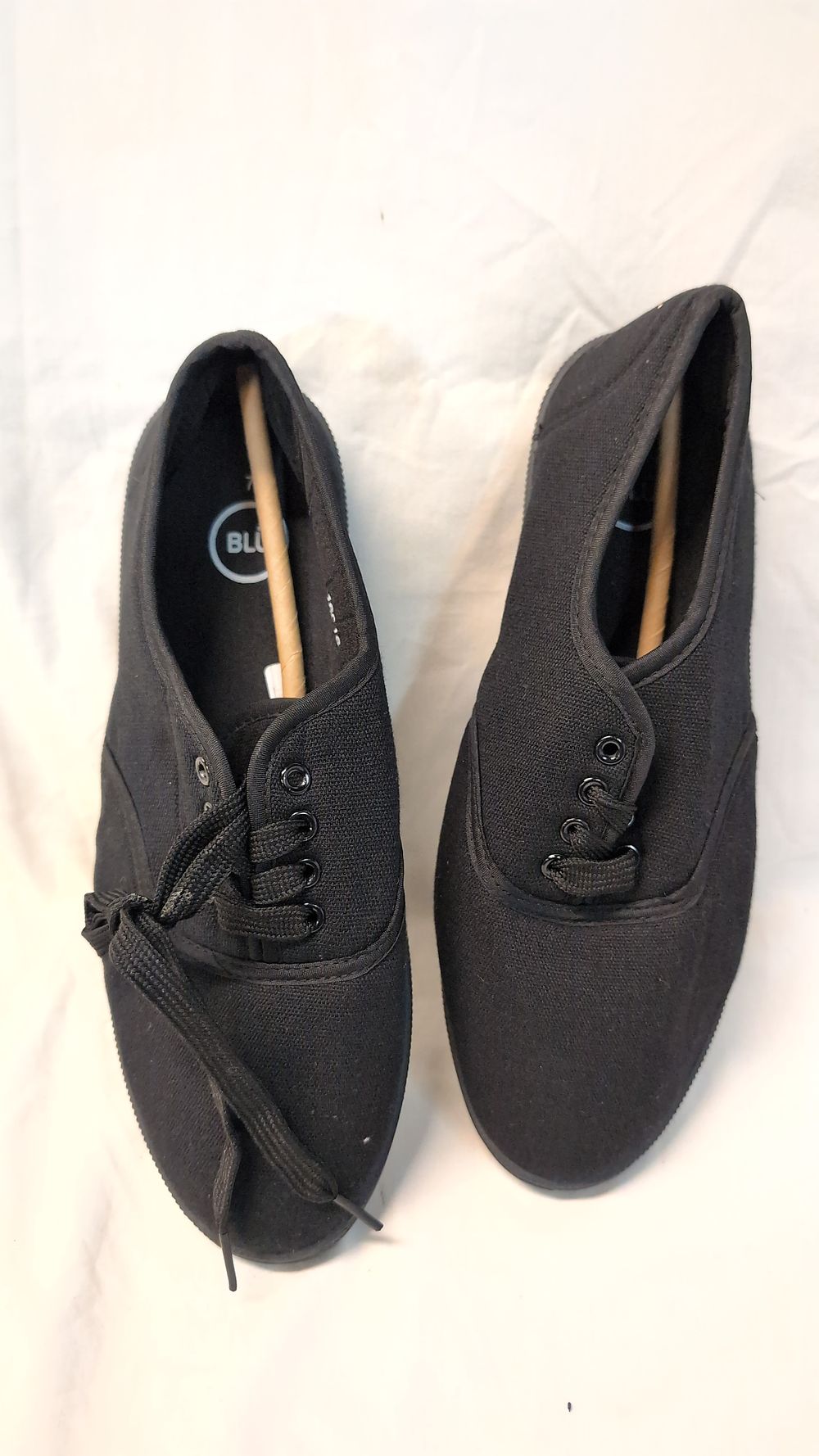 Lot 502: A Pair of Blue Inc. Black Canvas Low-Top Sneakers Size UK 7