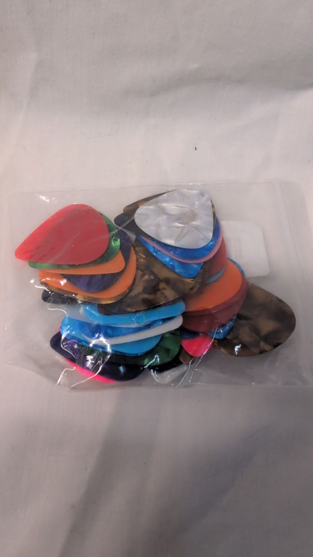 Lot 508: A Collection of 40 Guitar Plectrums