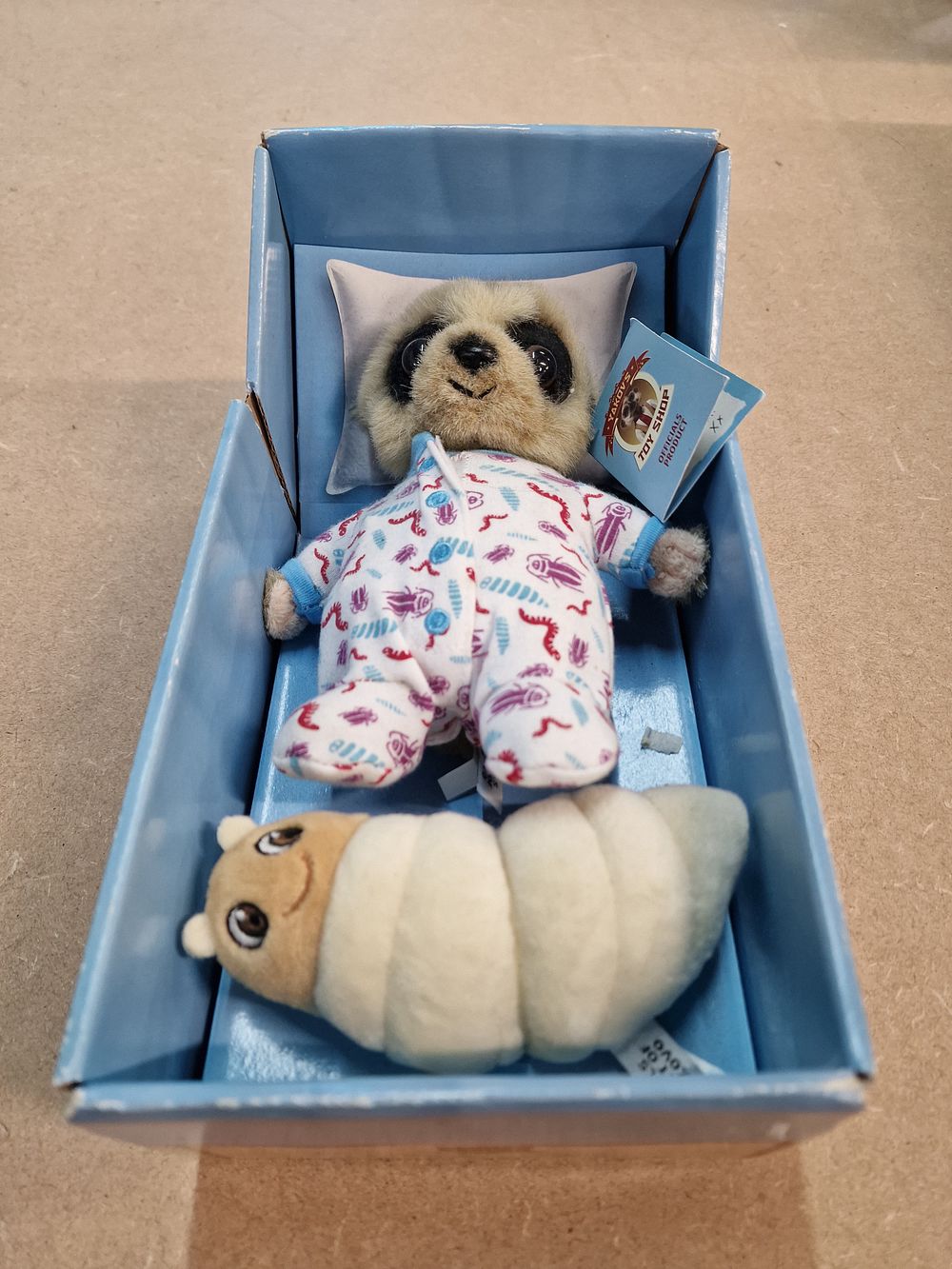 Lot 517: Compare the Market Baby Oleg Meerkat Plush Toy with Grub and Original Box