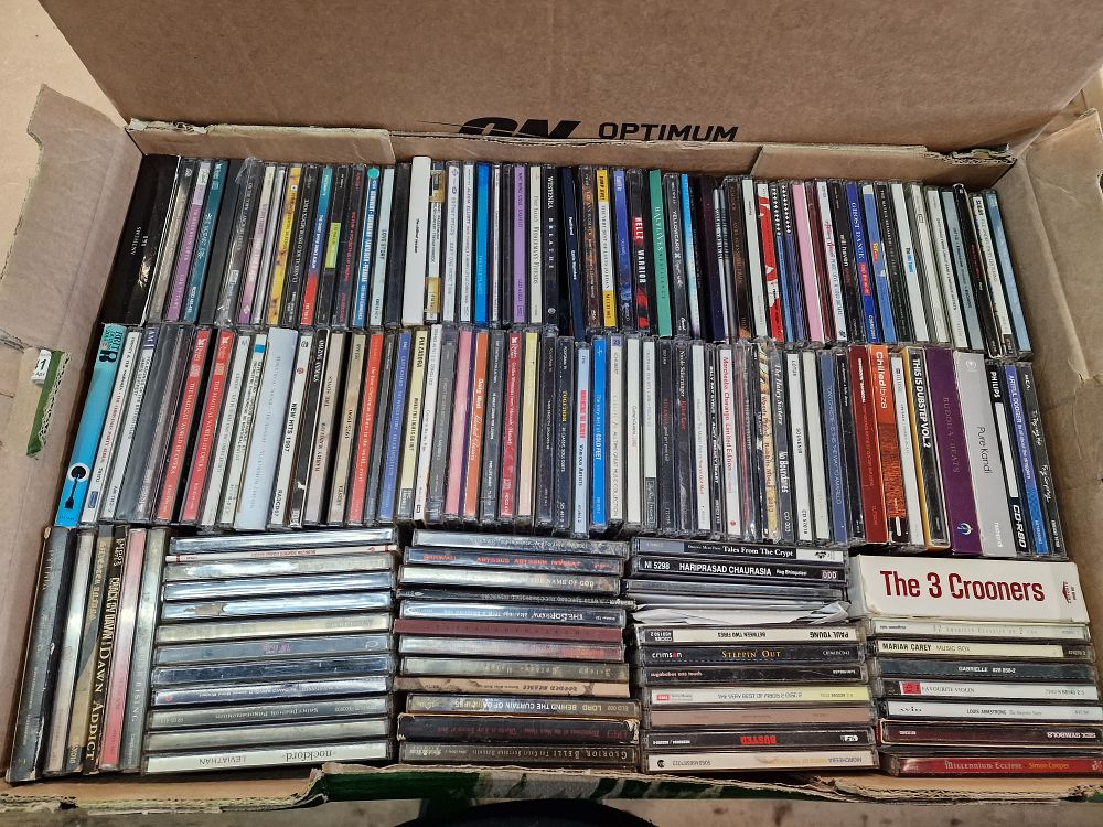 Lot 520: A Collection of Music Compact Discs Including Rock, Pop, Metal, and Classical Genres