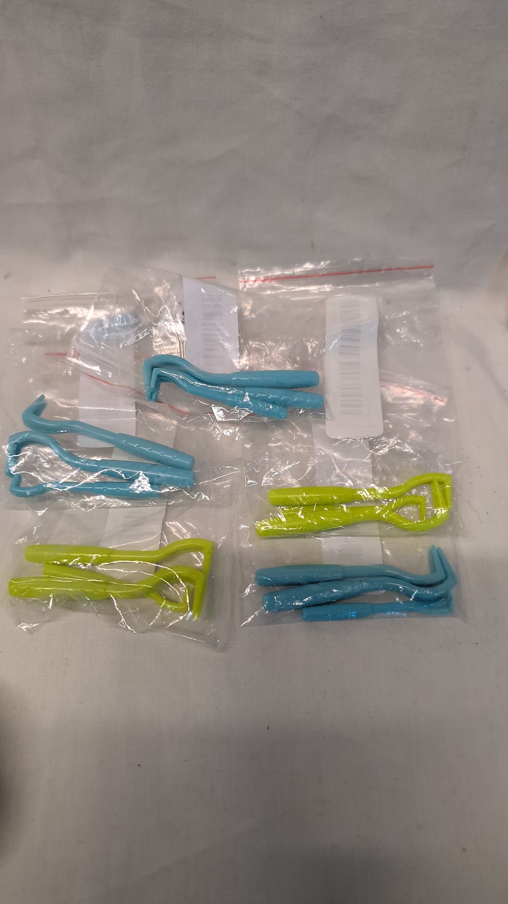 Lot 529: An Assortment of Plastic Tick Removal Tools