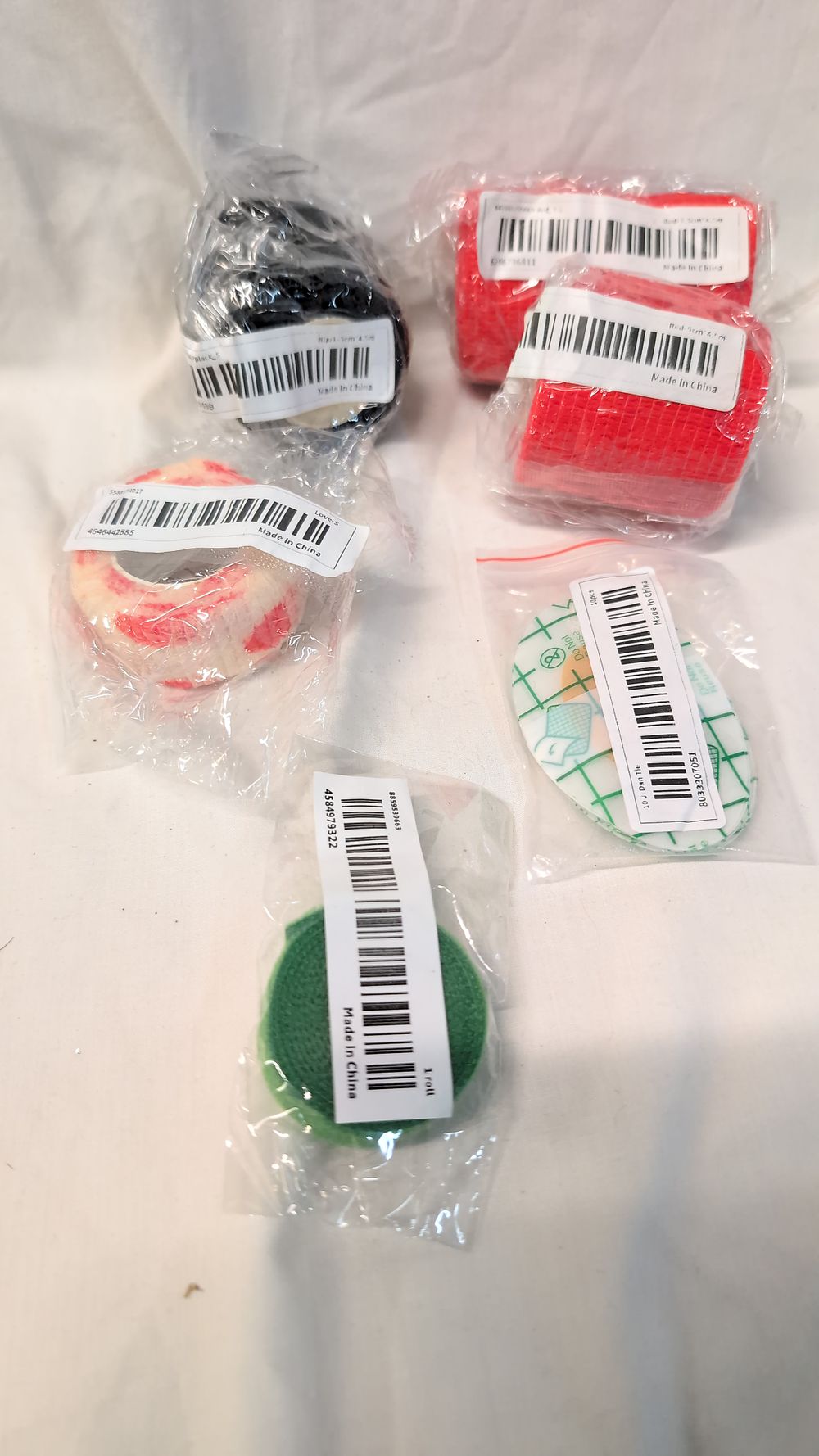 Lot 531: Seven Assorted Cohesive Bandages and Adhesive Patches