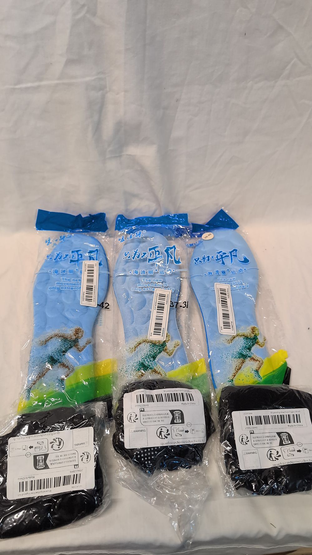 Lot 532: A Collection of Cushioned Athletic Insoles and Five-Finger Grip Accessories