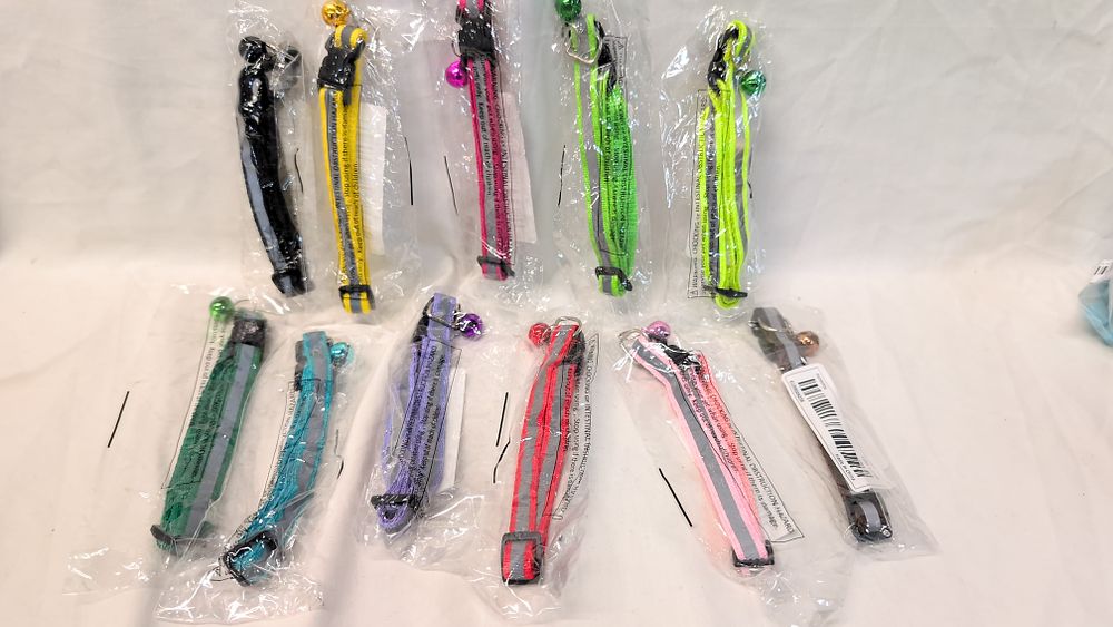 Lot 536: An Assortment of Reflective Adjustable Pet Collars with Bells