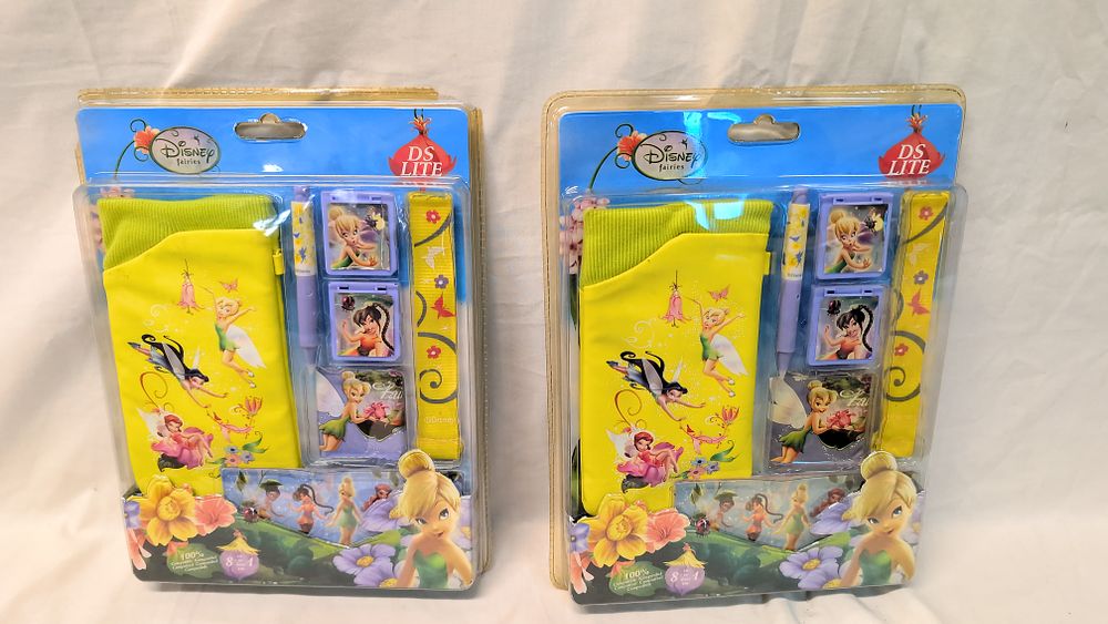 Lot 540: A Pair of Disney Fairies 8-in-1 Nintendo DS Lite Accessory Kits by Indeca Business S.A.