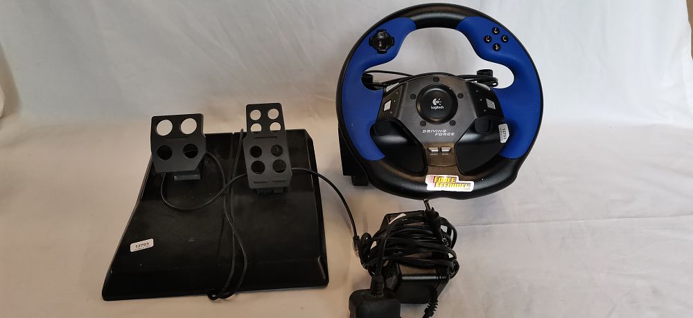 Lot 557: A Trio of Logitech Driving Force Gaming Peripherals Model E-UC2.