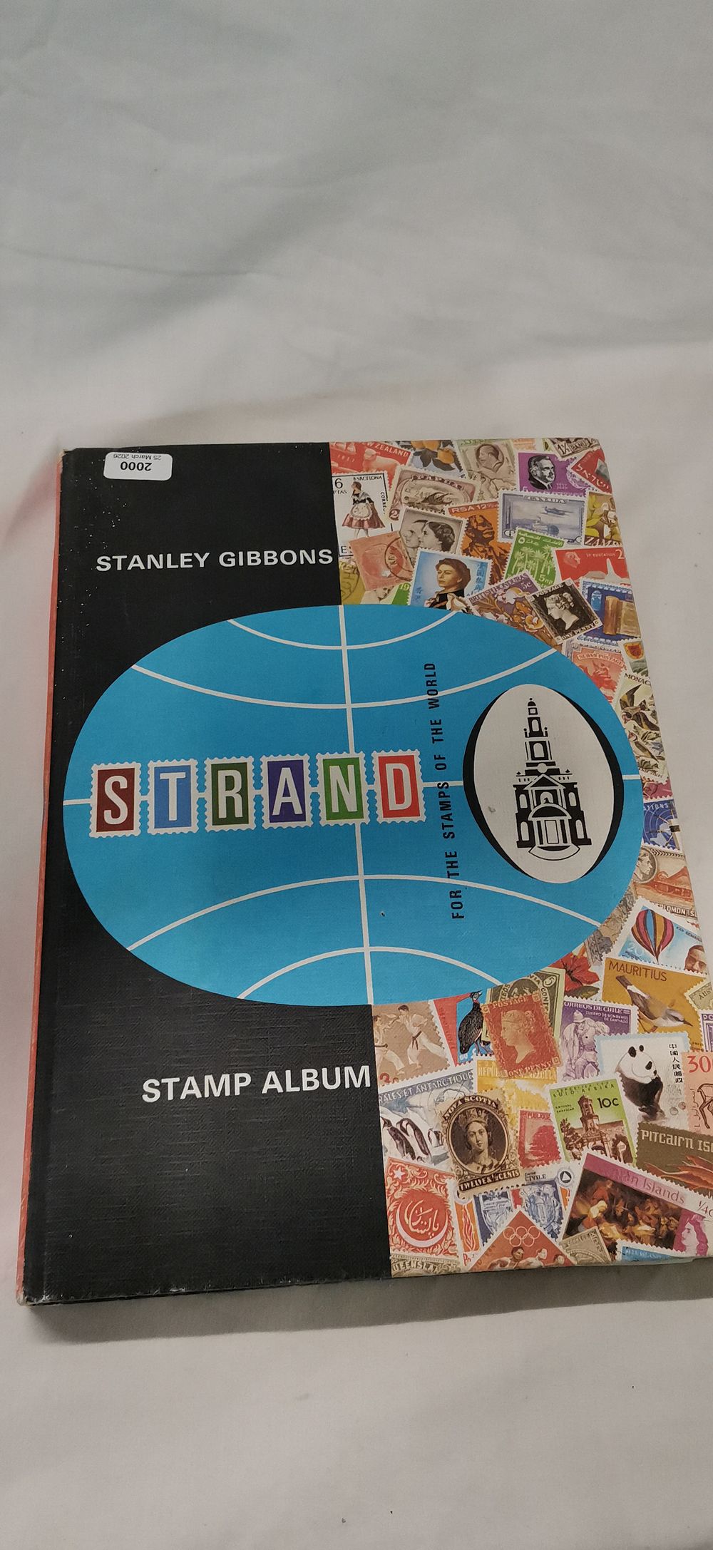 Lot 639: UK Stanley Gibbons Strand Stamp Album, World Collection