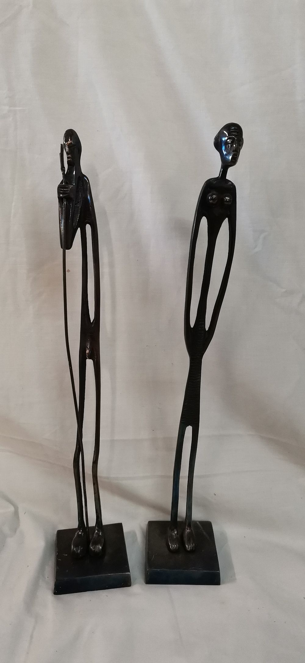 Lot 693: A Pair of Attributed Pottery Barn Shadow of Tall Family Abstract Cast Metal Sculptures