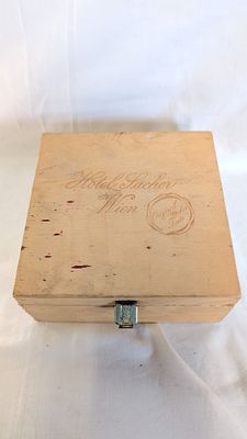 A Collection of British and International Coinage in a Vintage Hotel Sacher Wien Wooden Box. An 