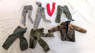 An Assortment of Vintage Hasbro G.I. Joe and Palitoy Action Man 1/6 Scale Clothing. This lot 