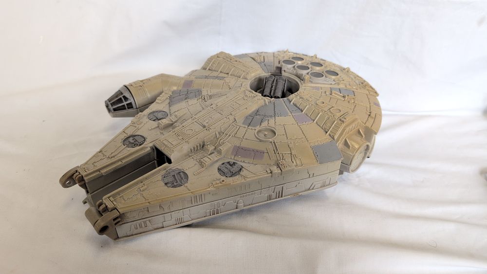 Lot 342: A 1995 Star Wars Micro Machines Millennium Falcon Transforming Play Set by Galoob