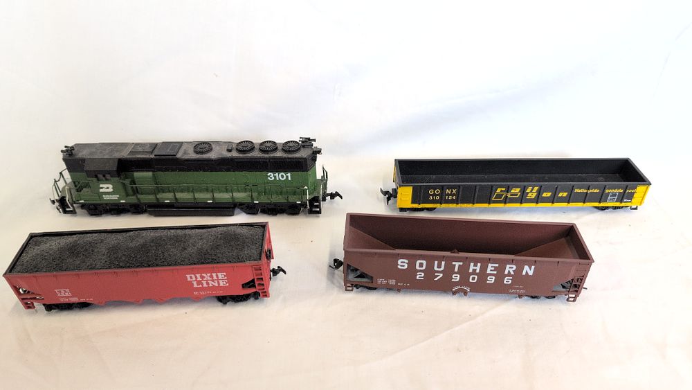 Lot 352: An Assortment of HO Scale American Outline Model Railway Locomotives and Freight Wagons