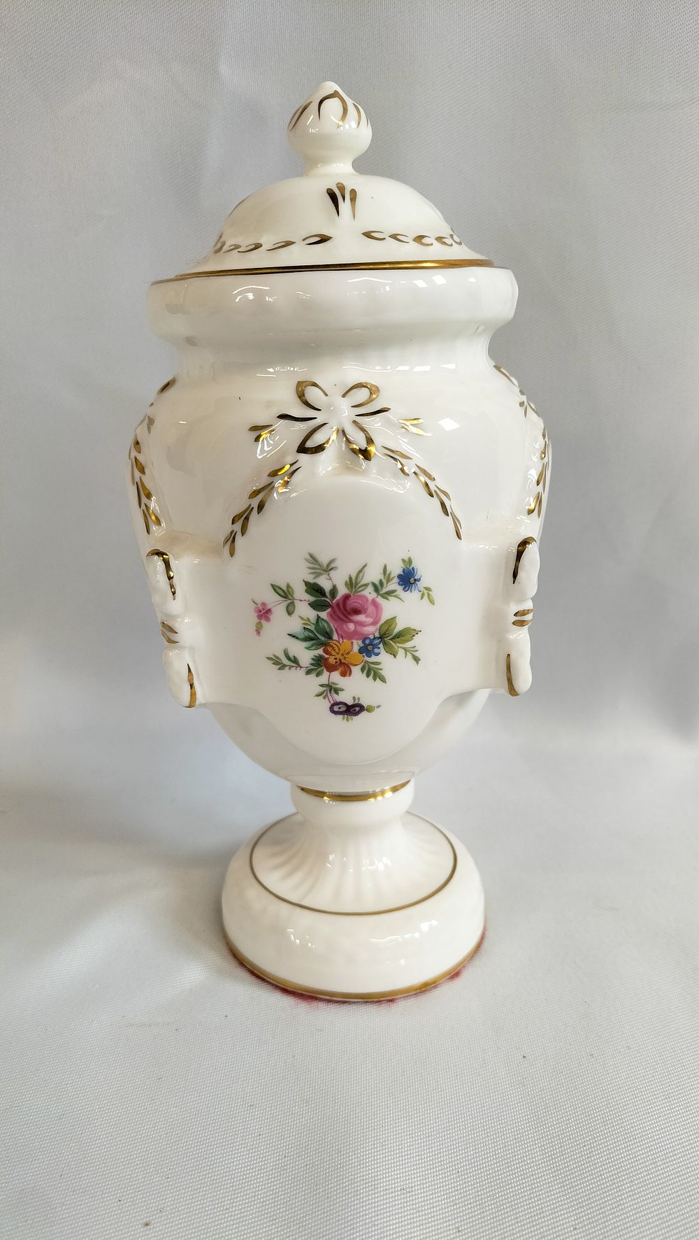 Lot 494: A Minton Bone China Lidded Miniature Urn with Floral and Gilded Decoration