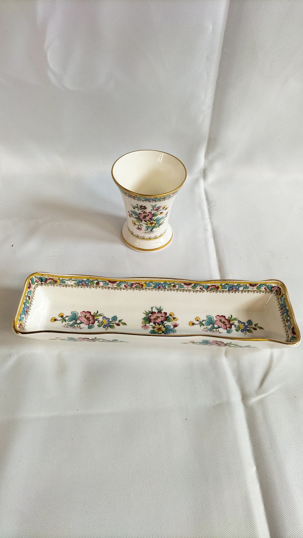 Lot 496: Two pieces of Coalport Ming Rose pattern bone china