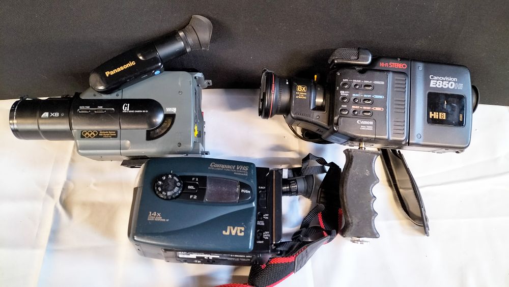 Lot 531: A Trio of Vintage Analogue Camcorders Including Panasonic NV-G1, Canon E850Hi, and JVC Compact VHS Models