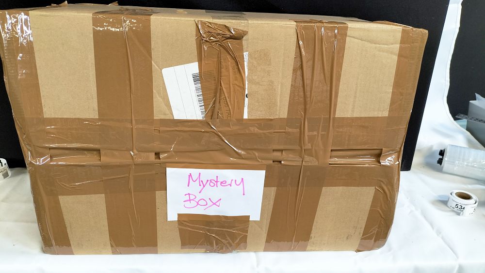 Lot 532: A Large Mystery Box Containing an Assortment of Uninspected Wholesale Goods