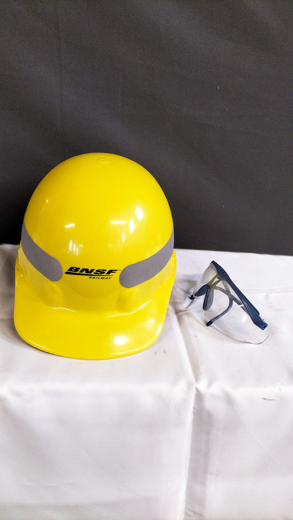 Lot 564: Two Items of Safety Equipment comprising a BNSF Railway Hard Hat and Safety Glasses