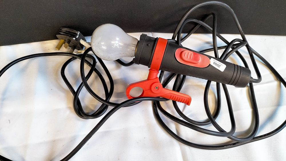 Lot 569: A portable electrical workshop inspection lamp