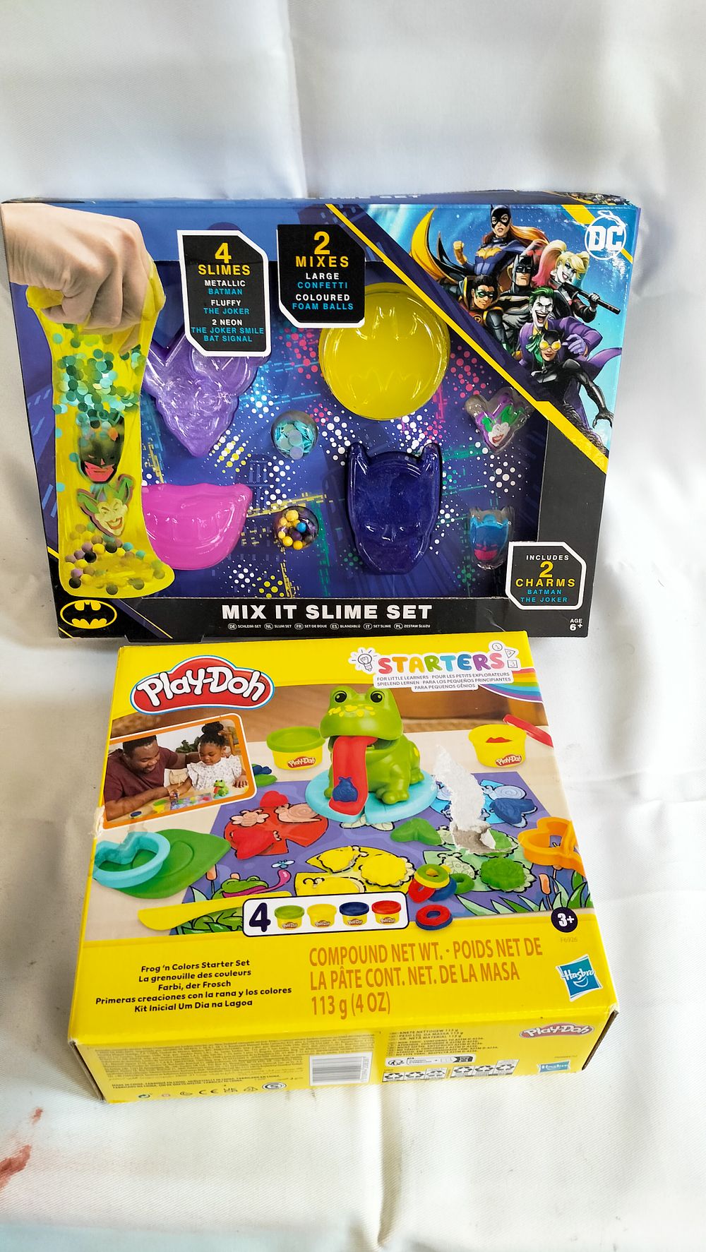 Lot 577: A Pair of Boxed Children's Creative Activity Sets comprising a DC Batman Slime Set and a Play-Doh Frog 'n Colors Set