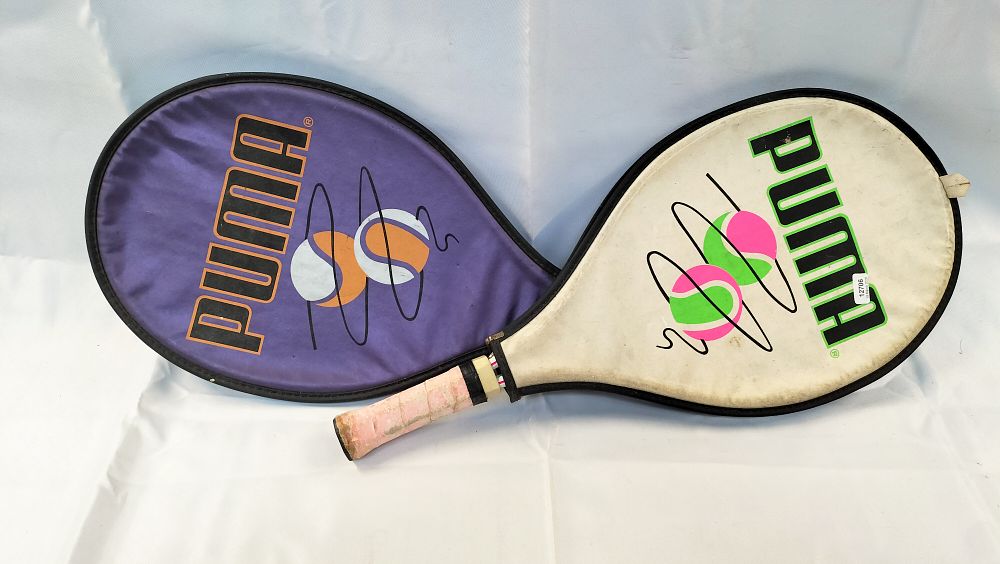 Lot 598: A Pair of Vintage Puma Tennis Rackets with Branded Head Covers