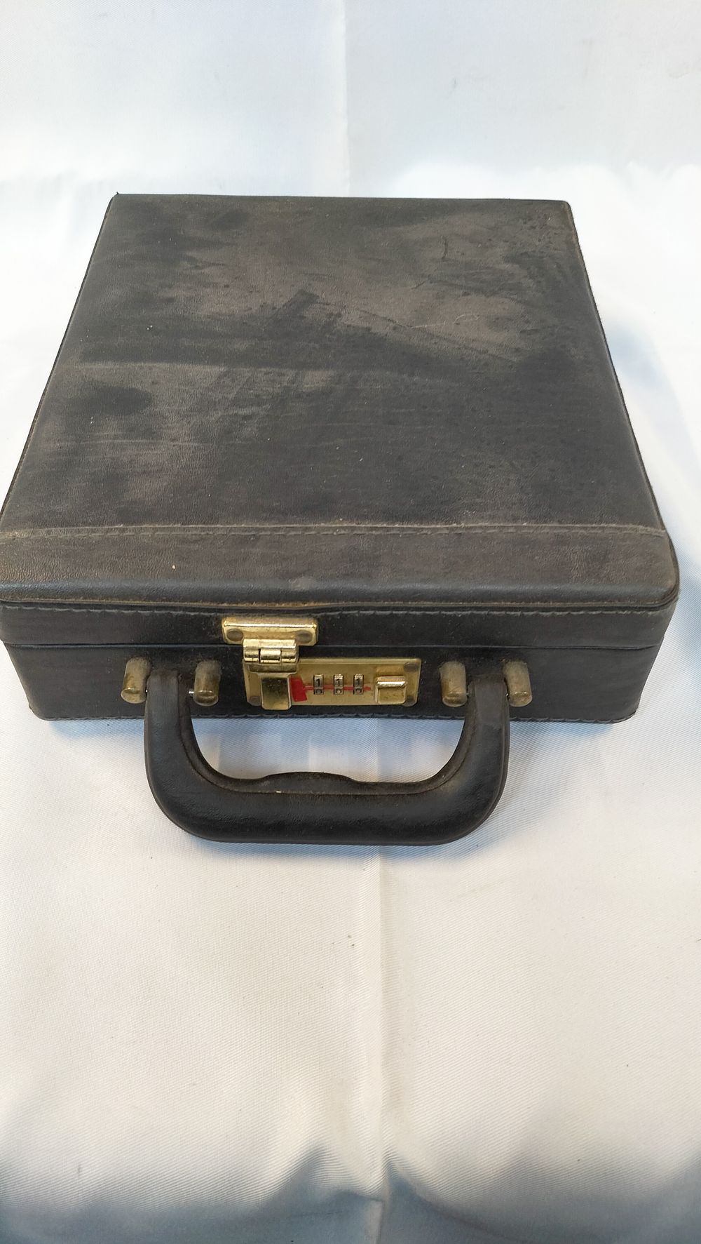 Lot 606: A Vintage Black Textured Synthetic Attache Case
