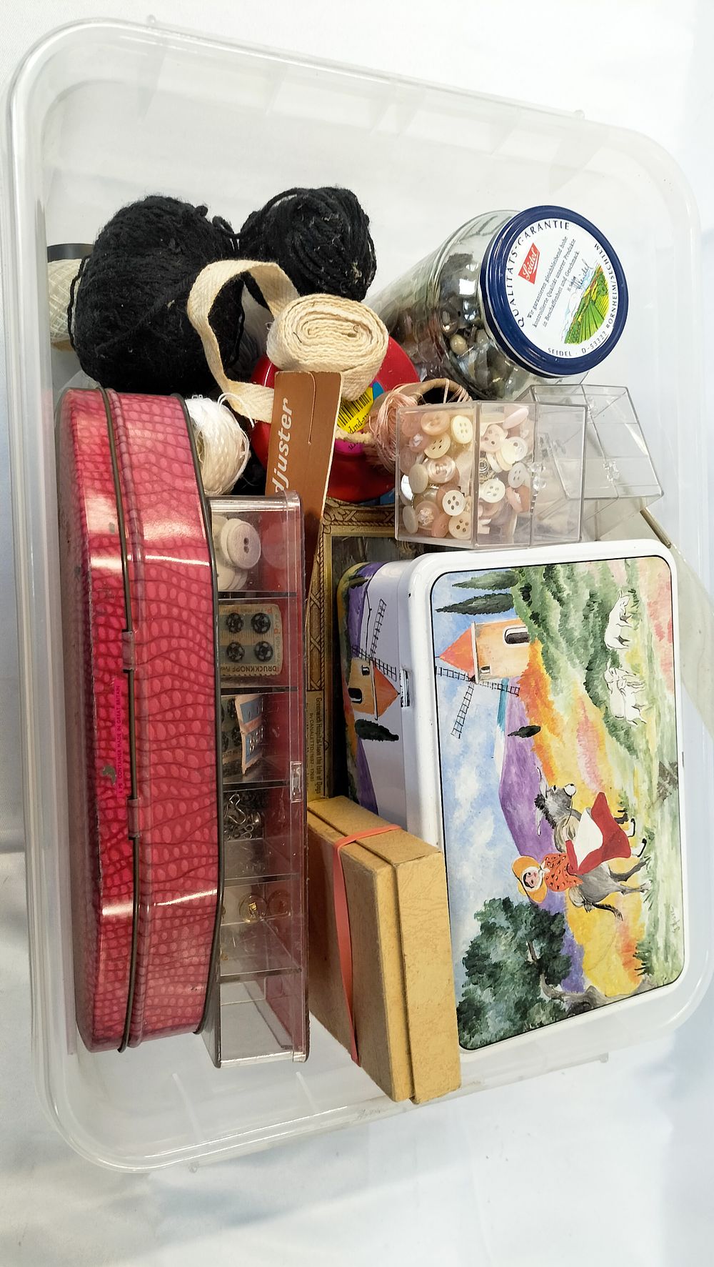 Lot 614: An Assortment of Vintage Sewing Notions, Supplies, and Decorative Tins