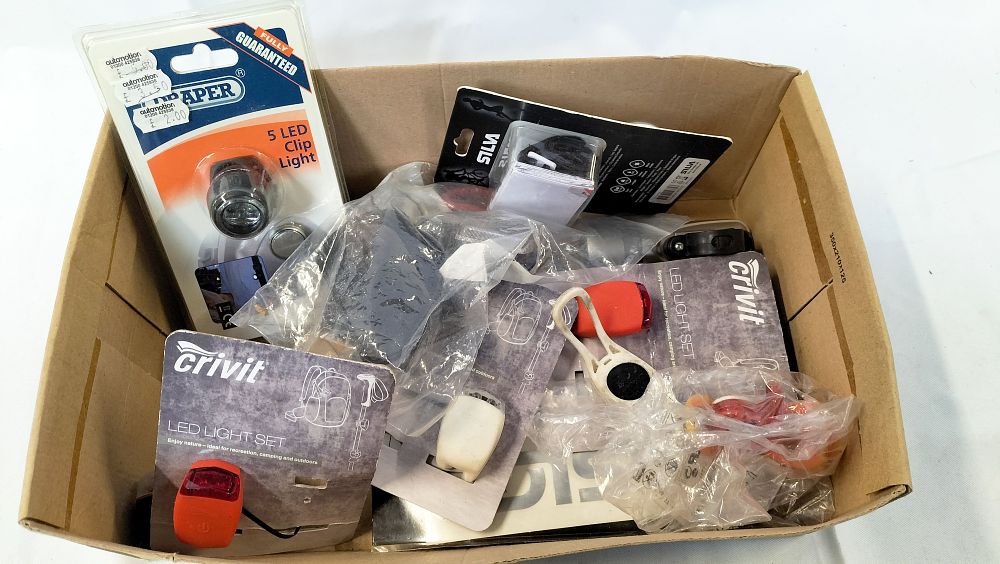 Lot 627: An Assortment of Bicycle and Outdoor Lighting Accessories by Silva, Draper, Crivit, and Others