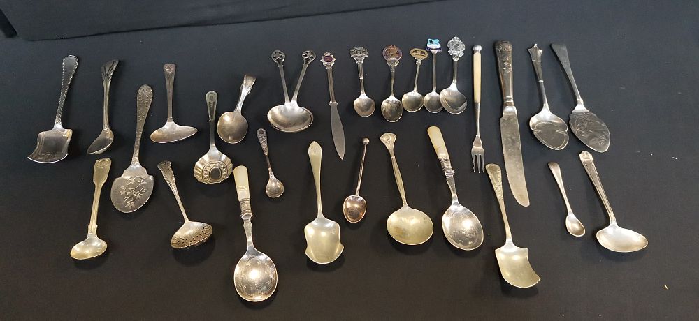 Lot 715: A Collection of Sterling Silver and Silver Plate Souvenir Cutlery