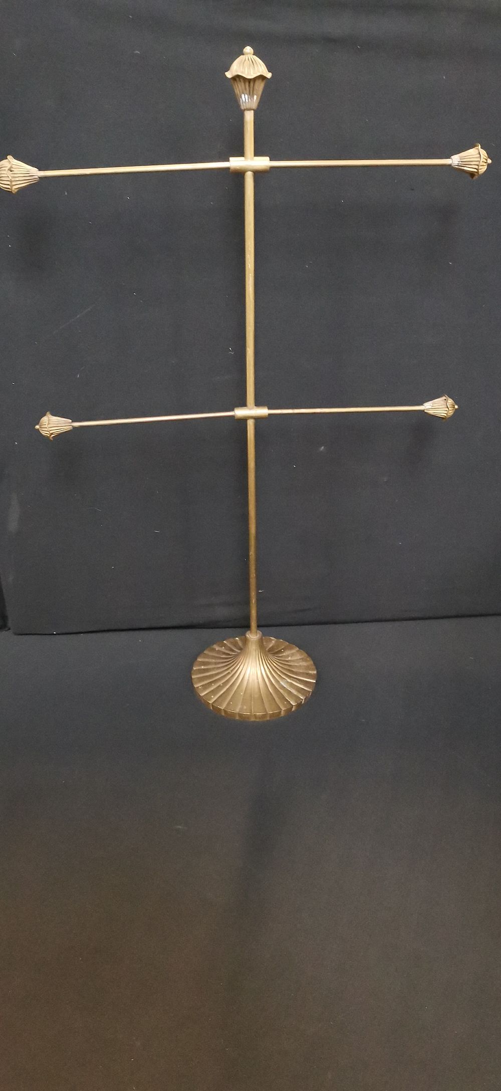 Lot 718: A Gold Toned Metal Two Tier Display Stand