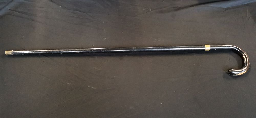 Lot 726: Harrods Black Walking Stick with Gold Toned Accents