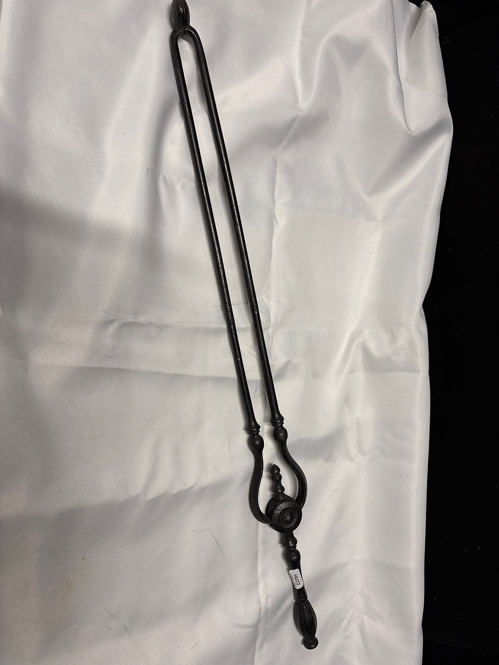 Lot 740: Wrought Iron Fireplace Tongs with Coal Grips
