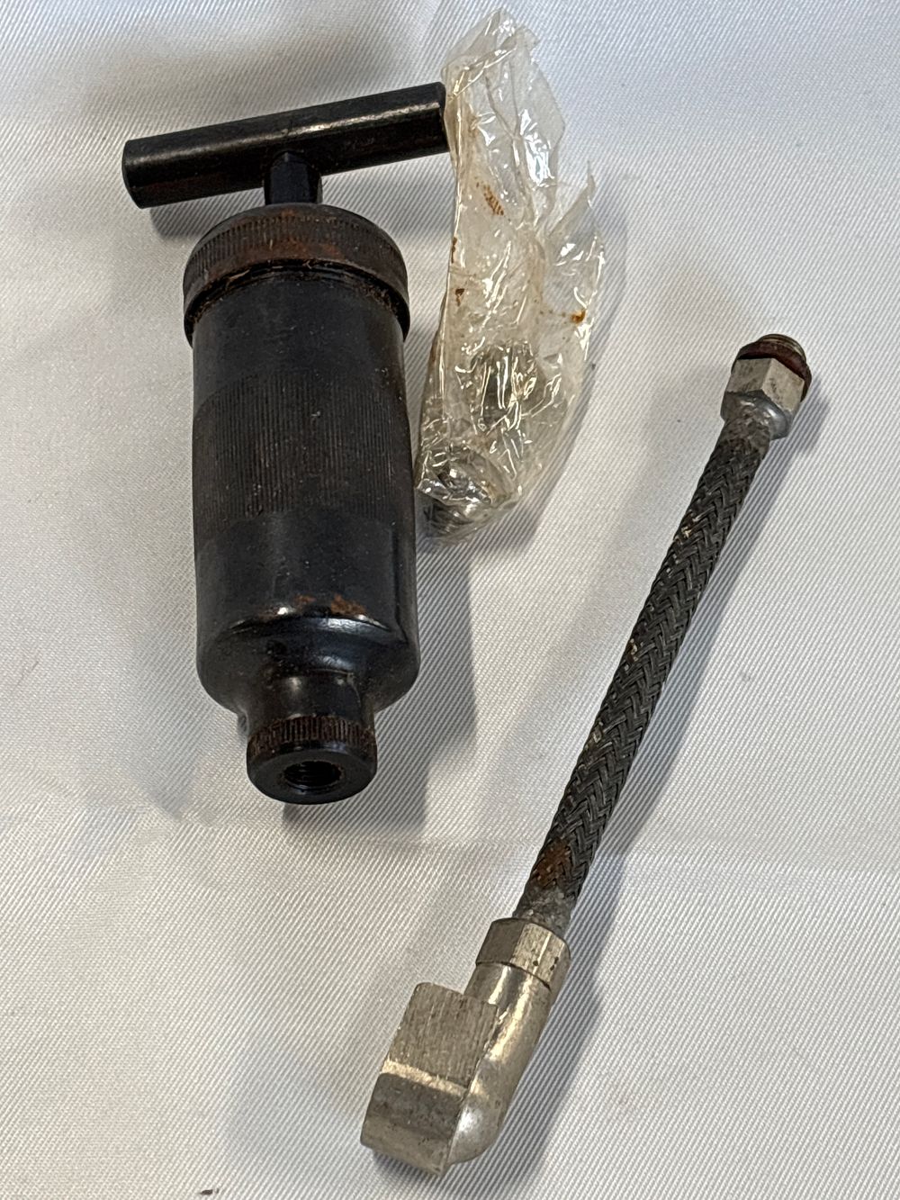Lot 770: A Vintage Stewart-Warner Alemite Screw-Type Grease Gun