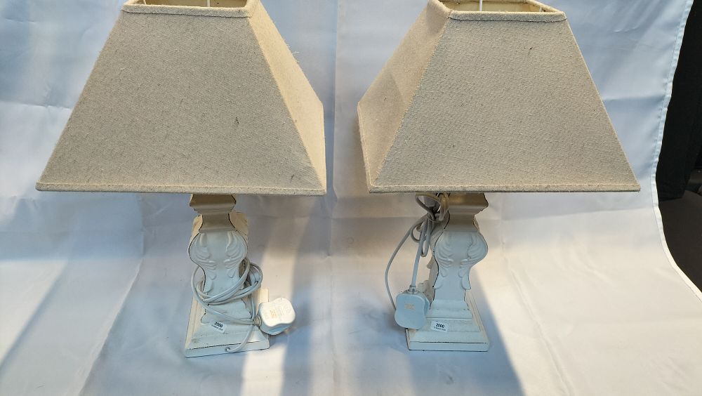Lot 789: A Pair of Distressed White French Provincial Style Table Lamps