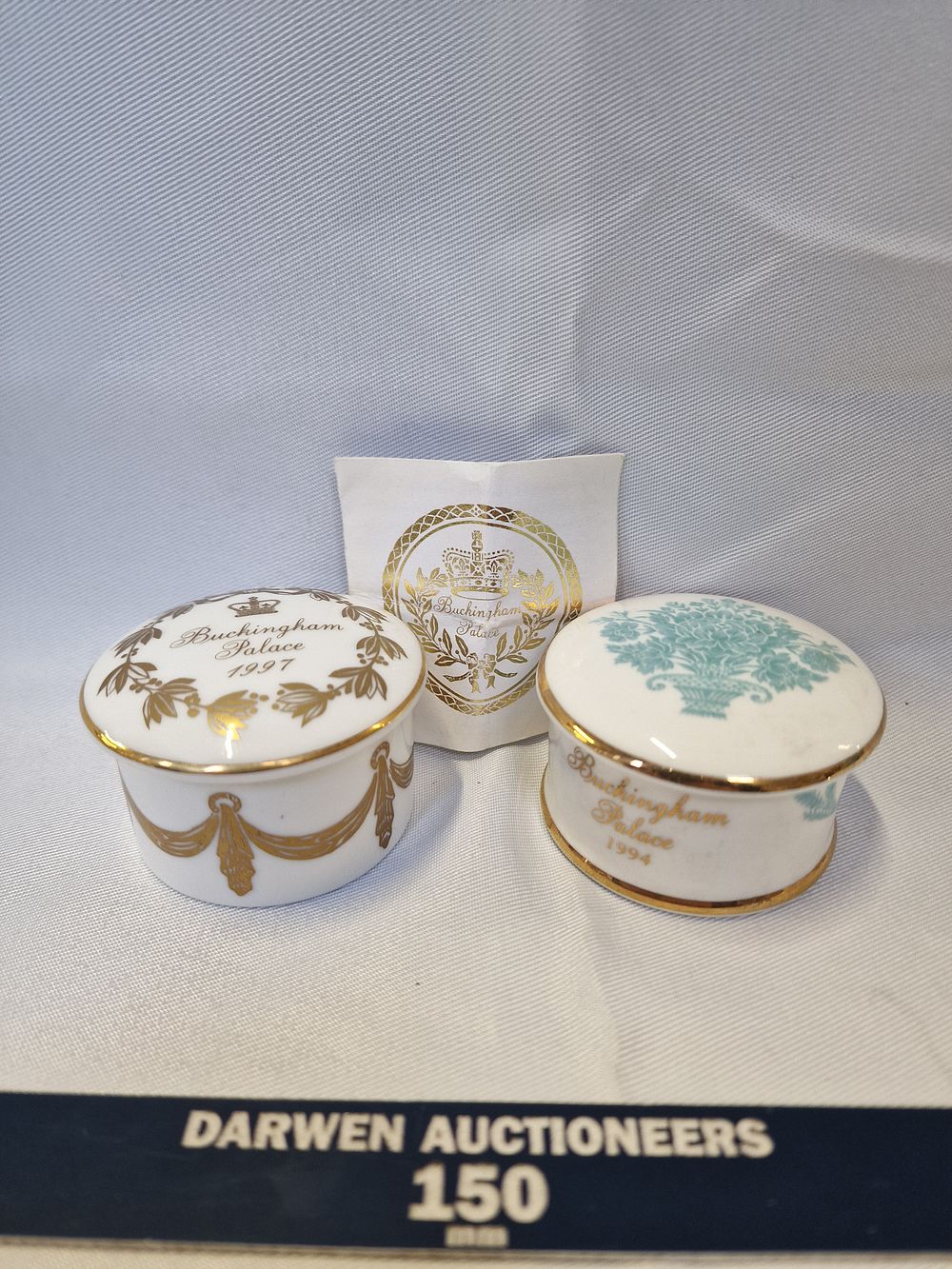 Lot 832: A Pair of Buckingham Palace Fine Bone China Commemorative Trinket Boxes, 1994 and 1997