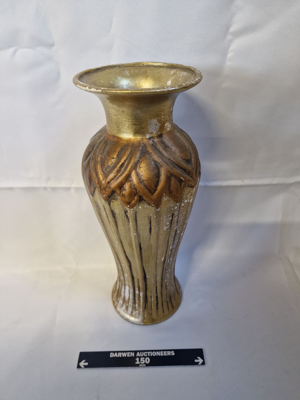 Lot 855: Gilded baluster vase with acanthus leaf relief decoration