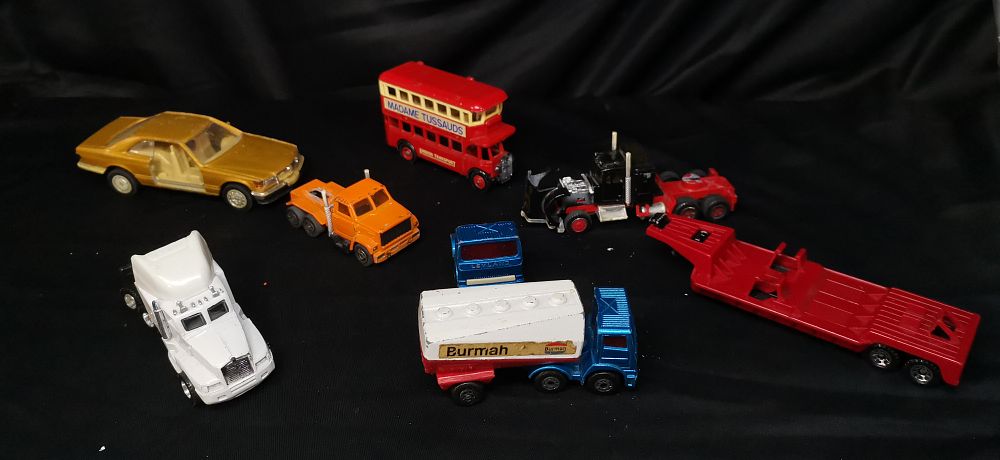 Lot 907: A Collection of Die-Cast Toy Vehicles and Trucks
