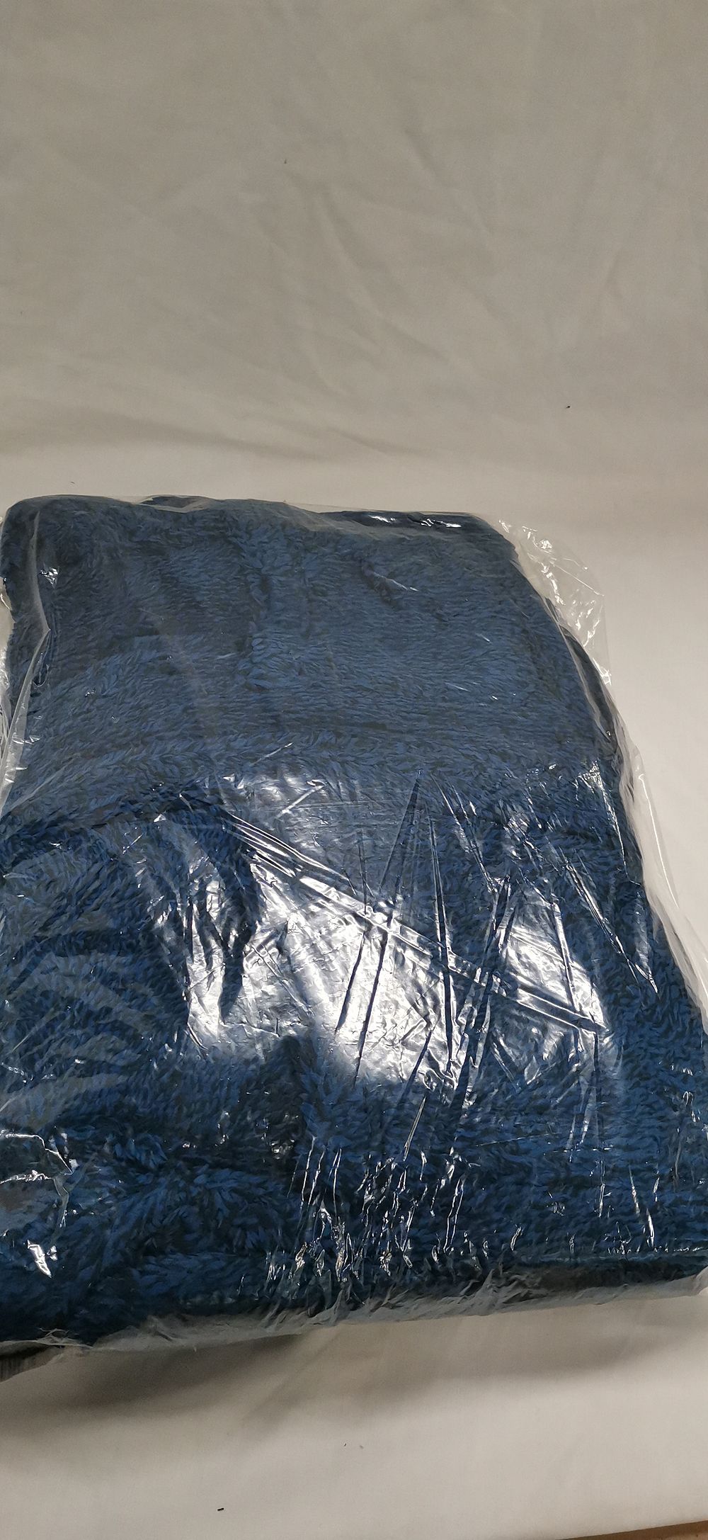 Lot 599: A Navy Blue Borg Fleece Dressing Gown for Ages 13-14 Years