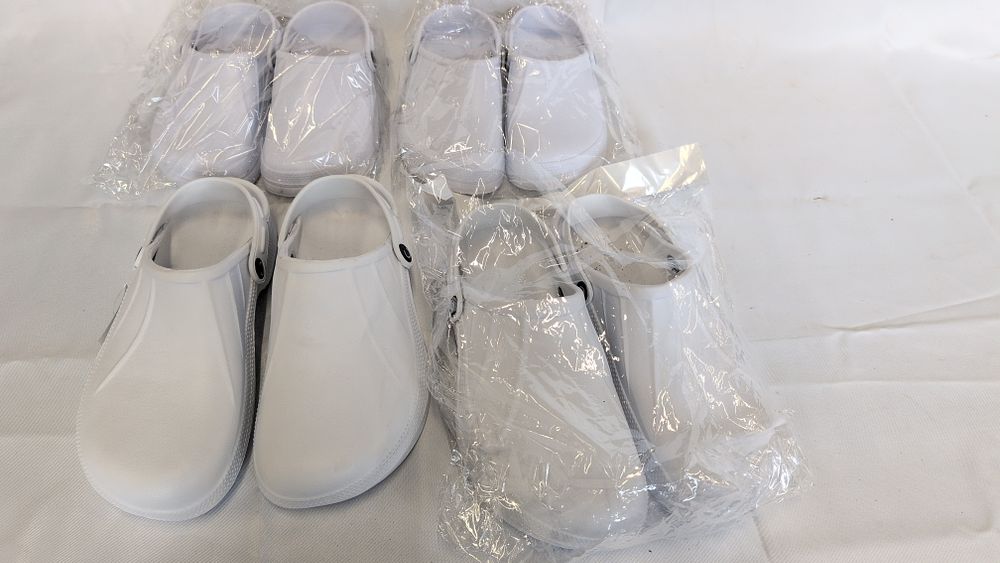 Lot 160: An Assortment of Professional White Cloggis Clogs