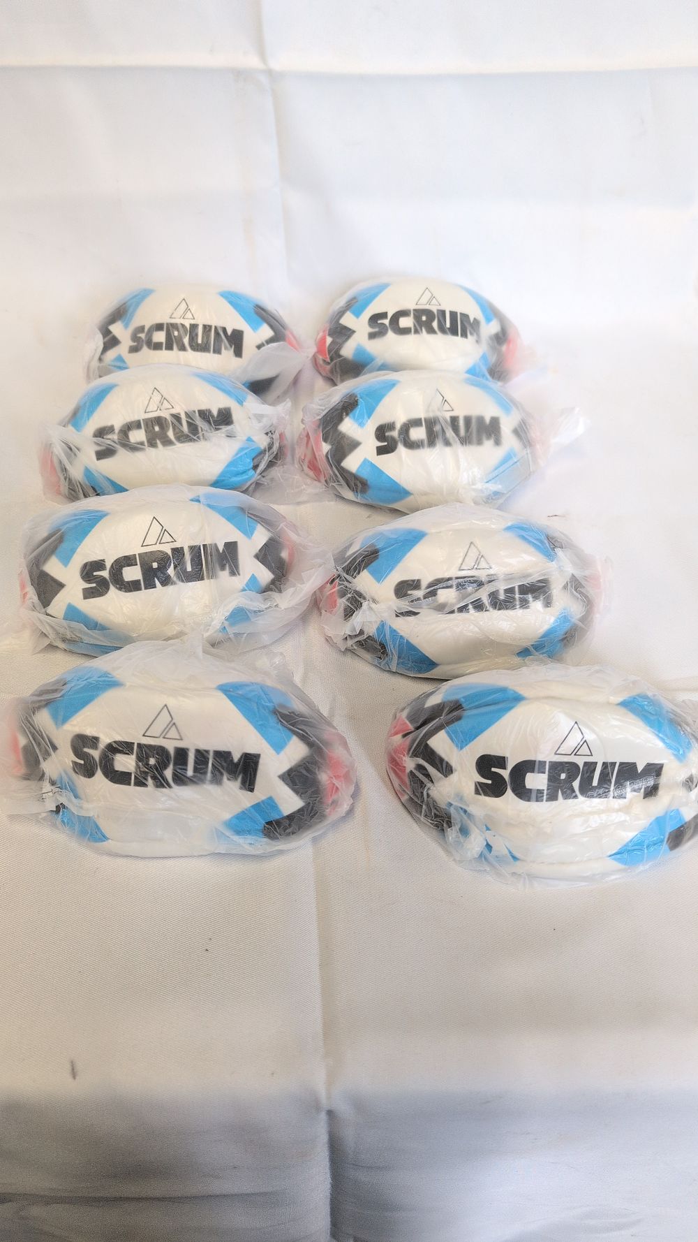 Lot 164: Eight Mini SCRUM Branded Souvenir Rugby Balls