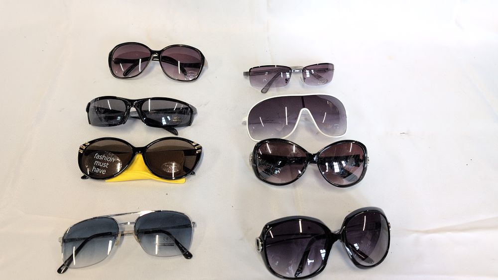 Lot 165: A Collection of Eight Pairs of Assorted Fashion Sunglasses