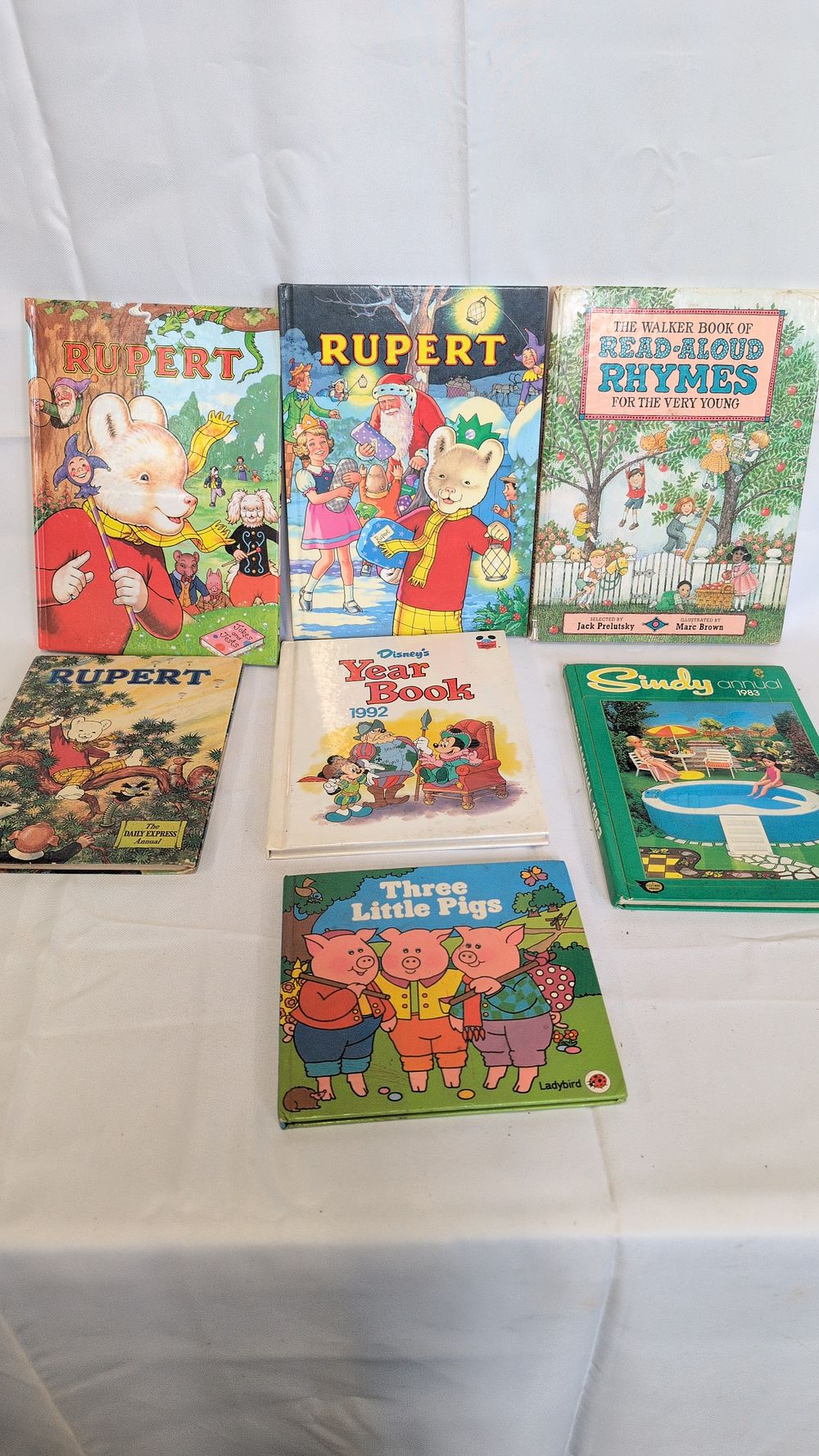 Lot 166: A Collection of Vintage Children's Books and Annuals, including Rupert Bear and Sindy, v.d.