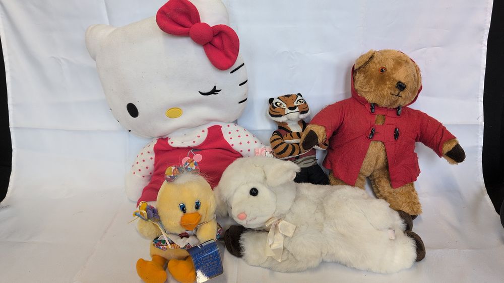 Lot 167: A Collection of Character and Animal Plush Soft Toys including Hello Kitty and Paddington Bear