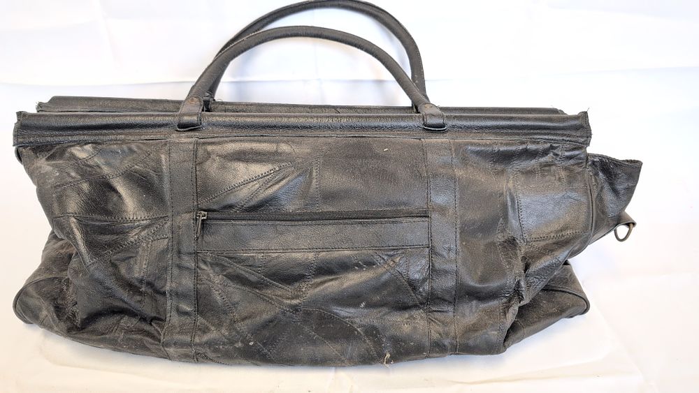 Lot 168: A Vintage Black Patchwork Leather Large Duffel Bag