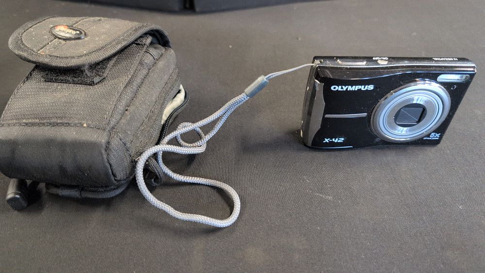 Lot 382: Olympus X-42 Compact Digital Camera with Lowepro Case. Tested for power