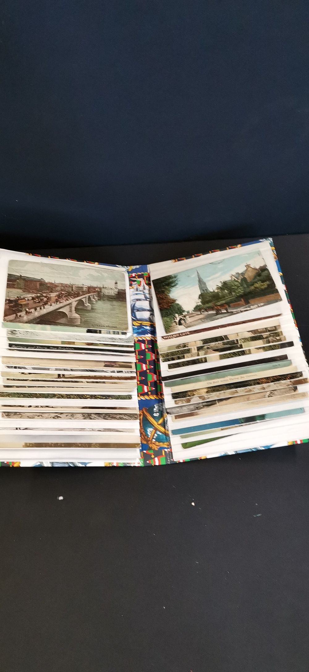 Lot 386: An Album Containing a Collection of Early 20th Century UK Topographical and Historical Postcards